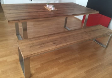 Kavas Metallbau: Großer Esstisch mit passender Bank aus Metall und Holz